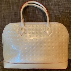 Arcadia bag with red piping